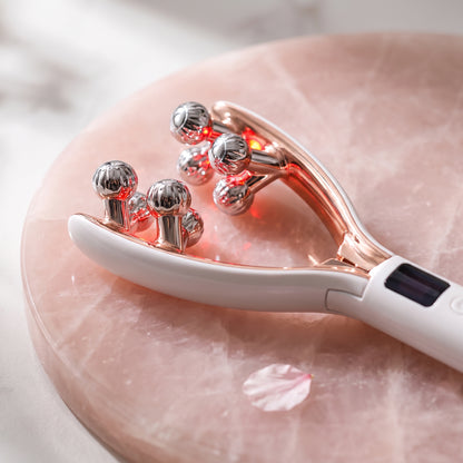 Lumiglo Sculpt facial massager, four chrome rotating heads with red light